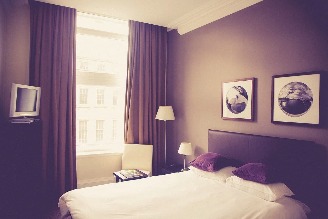 A well-decorated room in Sites Hotel, featuring modern design and cozy ambiance.