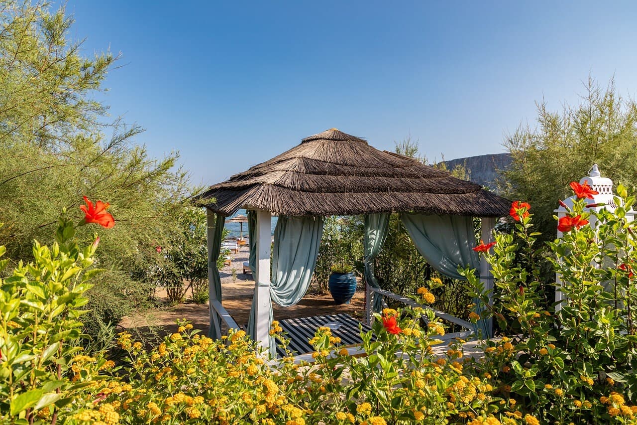 Woman enjoying a relaxing massage at a Bali spa, surrounded by a tranquil atmosphere and natural elements.