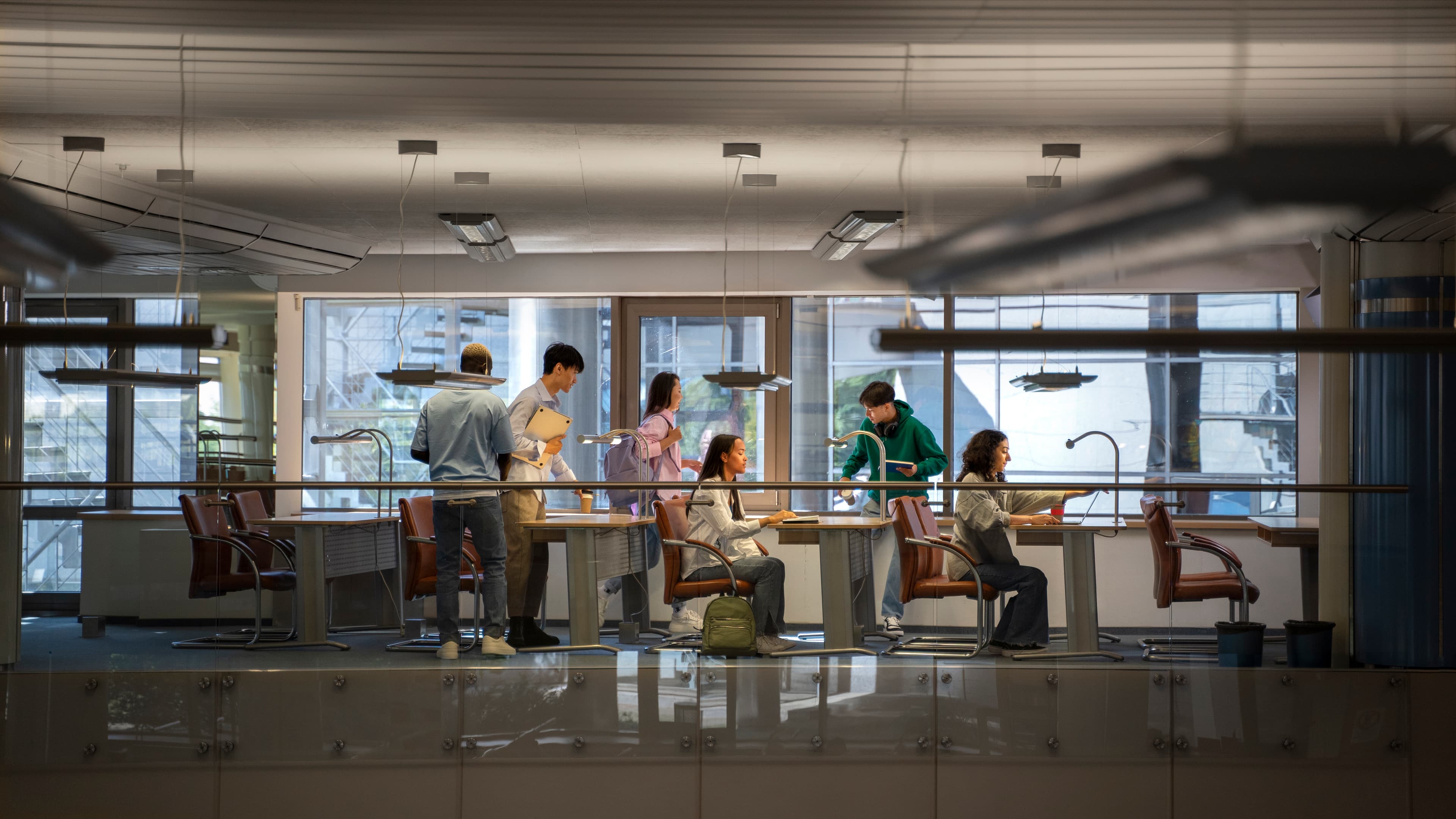 Punspace interior with people working on modern equipment